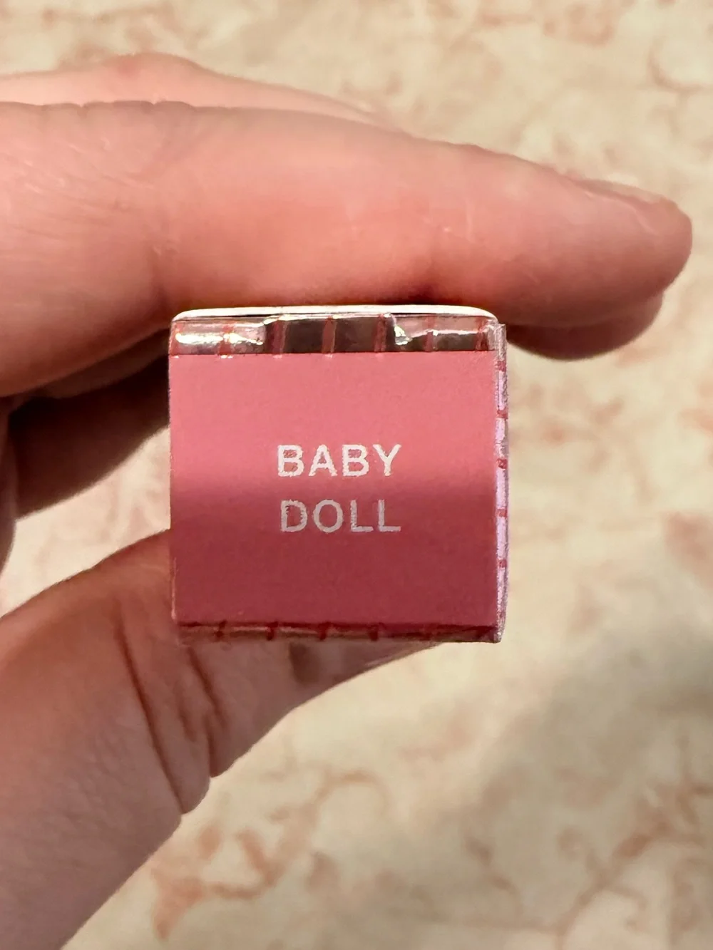 Lawless Forget the Filler Lip-Plumping Tinted Lip Balm in shade Baby Doll